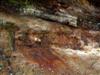 Coal outcrop along highwall with pollution